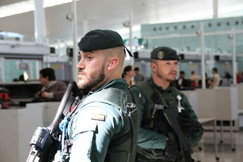 Airport Security Guardsmen provide survaillance at Albalitor's international airport.